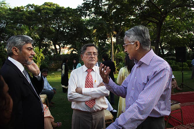 Asif Noorani (Centre) one of the guest 
speakers at the launch spoke on how well 
the churches had been photographed, adding 
some pictures were taken very imaginatively.